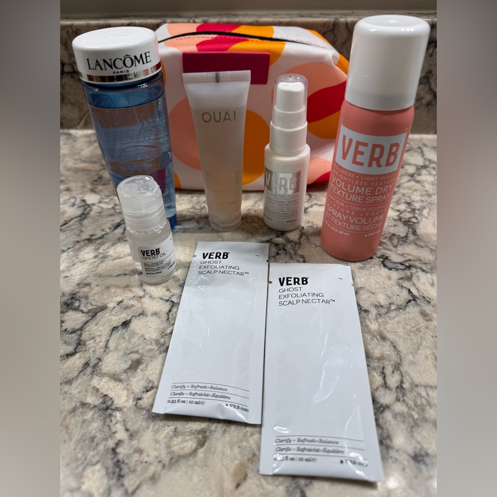 Beauty samples w/Clinique Cosmetic Bag